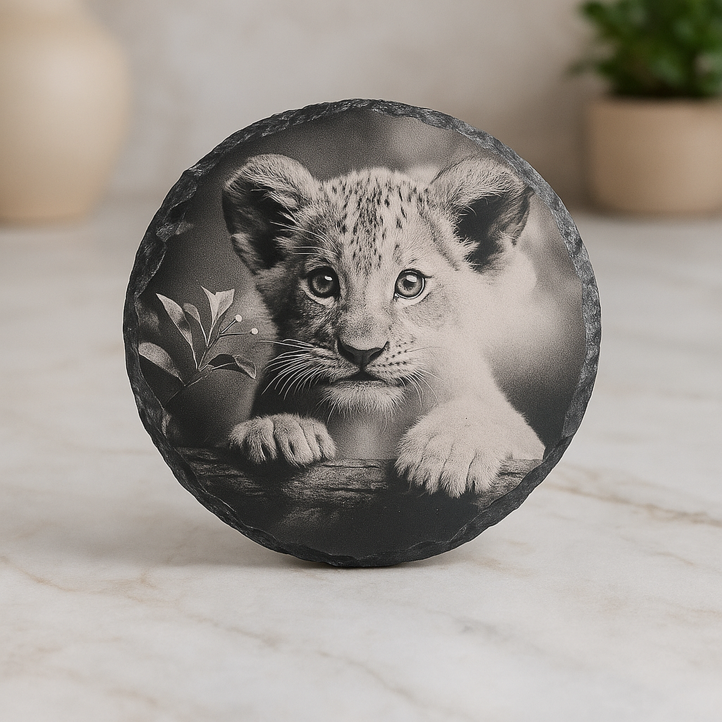 A handcrafted touch of the wild — engraved slate coasters that tell a story.